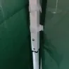 Tonnelle pliante 3x3 m en acier vert avec parois latérales